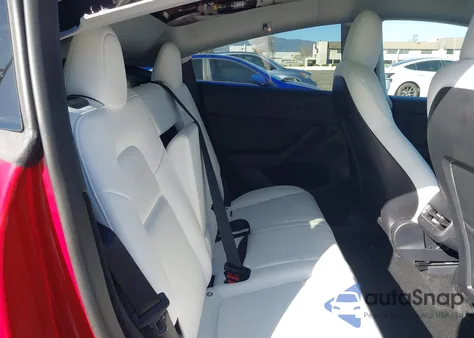 2023 Tesla Model Y Awd/Long Range Dual Motor All-Wheel Drive z USA, uszkodzony, nr VIN 7SAYGDEE4PF623615